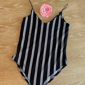 Black and white stripped bodysuit